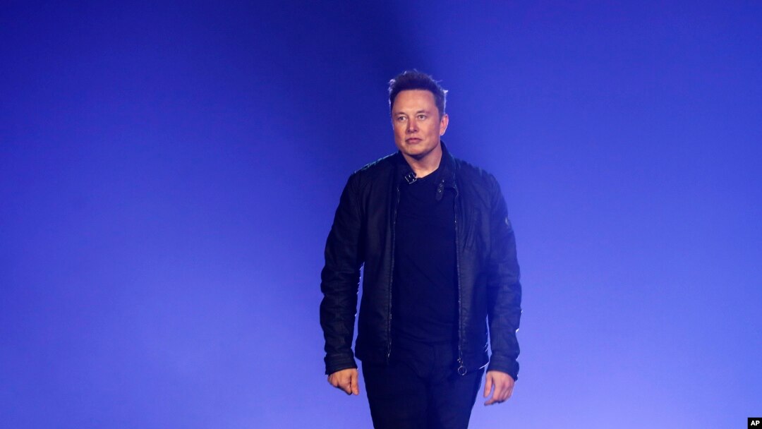 In this file photo, Tesla CEO Elon Musk introduces the Cybertruck at Tesla's design studio on Nov. 21, 2019, in Hawthorne, Calif. (AP Photo/Ringo H.W. Chiu, File)