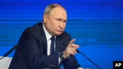 FILE - Russian President Vladimir Putin speaks during a meeting with his election campaign activists in Moscow, Jan. 31, 2024. Putin won a record post-Soviet landslide in Russia's election this year.