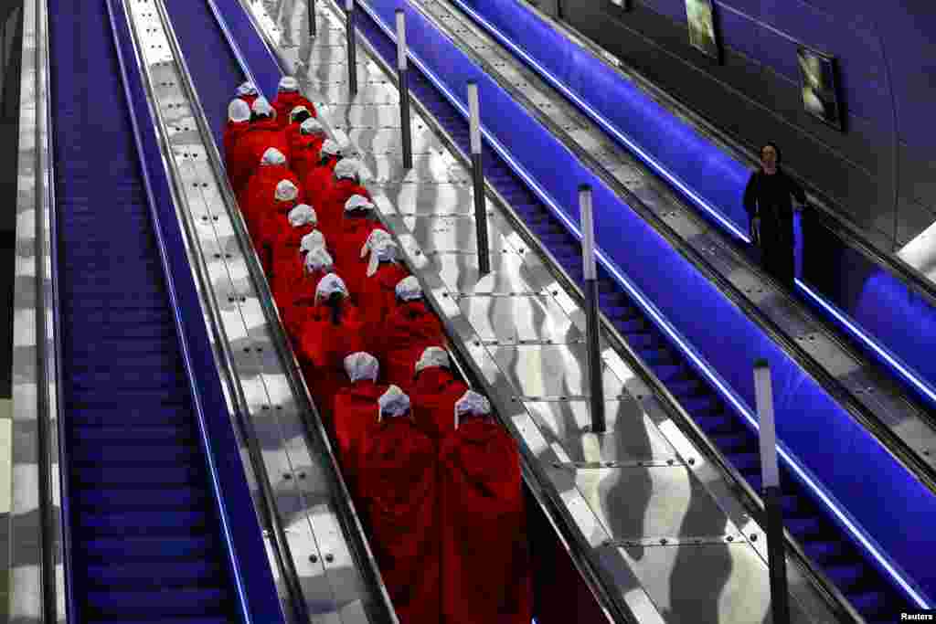 Women dressed as handmaidens from "The Handmaid's Tale" TV series arrive by train in Jerusalem to demonstrate as Israeli Prime Minister Benjamin Netanyahu's nationalist coalition government presses on with its contentious judicial overhaul.