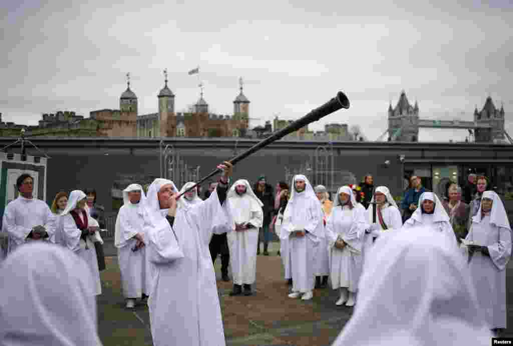 Members of the Druid Order take part in a ceremony celebrating the Spring Equinox, on Tower Hill in London, March 20, 2023.