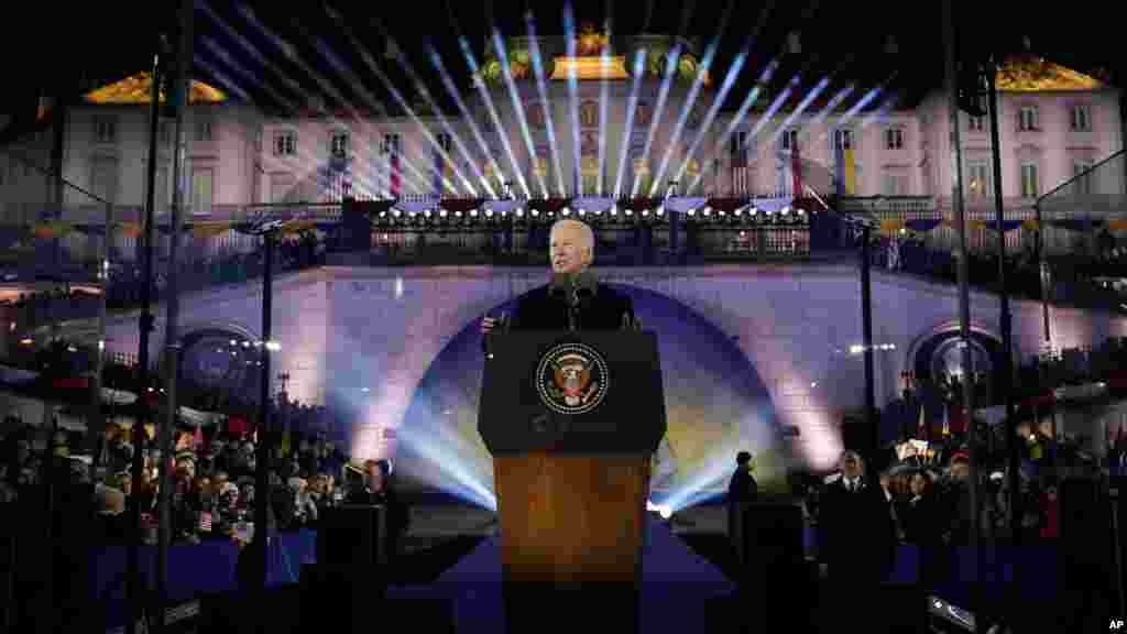 U.S. President Joe Biden delivers a speech marking the one-year anniversary of the Russian invasion of Ukraine, at the Royal Castle Gardens in Warsaw, Poland.