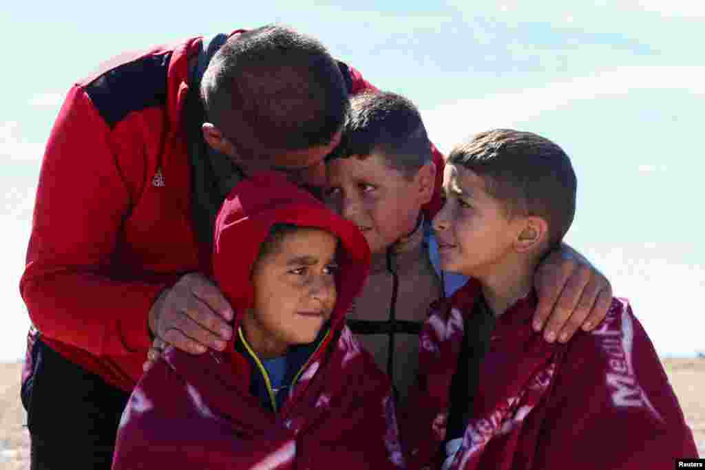Migrants arrive in Dungeness, Britain. Dozens of men, women and children were brought ashore on the southern coast of England, tired but relieved to be on land after making the risky sea crossing from France in rubber dinghies.