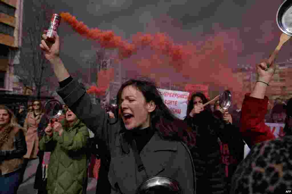 Women take part in a rally for gender equality and against violence towards women to mark the International Women's Day in Pristina, Kosovo.