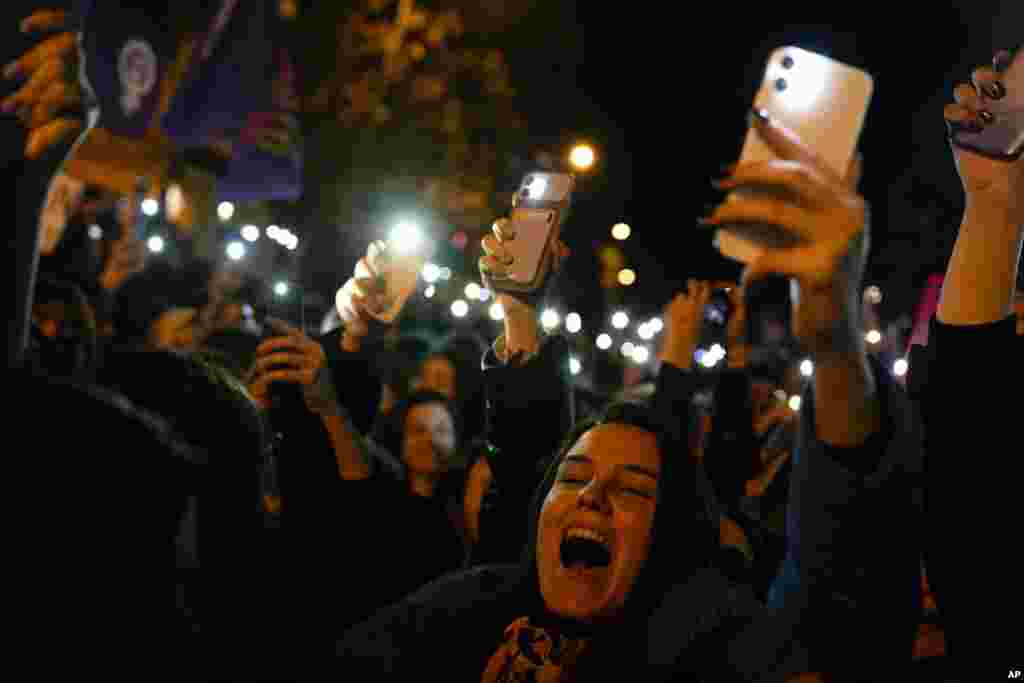 Women shout slogans as they gather to mark International Women's Day in Istanbul, Turkey.