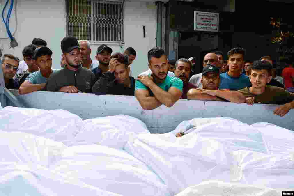 Mourners attend the funeral of Palestinians from the Shamalkh family, who health officials said were killed in Israeli strikes, in Gaza City. 