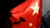 北京街頭一面中國國旗後的監視器畫面。 （2022年11月3日）