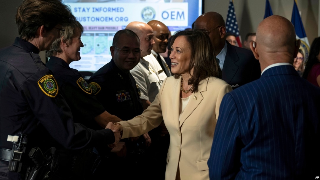Democratic presidential candidate Vice President Kamala Harris greets first responders after receiving a briefing on Hurricane Beryl recovery efforts at the City of Houston Emergency Operation Center in Houston, Texas, July 24, 2024.