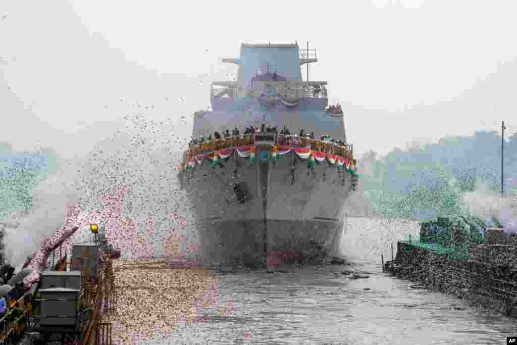Indian President Droupadi Murmu (not shown) launches NS Vindhyagiri, a P17A series warship built by the Garden Reach Shipbuilders and Engineers, in Kolkata.