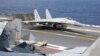FILE - In this photo released by Xinhua News Agency, a J-15 Chinese fighter jet prepares to take off from an aircraft carrier during military exercises around the Taiwan Island by the Chinese People's Liberation Army, April 9, 2023. 
