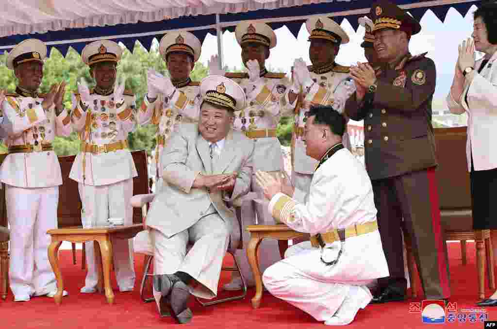 North Korean leader Kim Jong Un, center, attends the unveiling ceremony of the new submarine No. 841, named the Hero Kim Kun Ok, at an undisclosed location in North Korea, in this picture taken Sept. 6, 2023, and released by North Korea's official Korean Central News Agency on September 8. North Korea on September 8 announced it had built a "tactical nuclear attack submarine" as part of its effort to strengthen its naval force, the state news agency KCNA reported. 