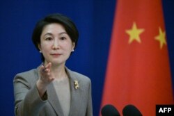 Juru bicara Kementerian Luar Negeri China Mao Ning dalam konferensi pers di Kementerian Luar Negeri di Beijing, 15 Januari 2024. (Pedro Pardo / AFP)