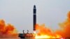 This photo provided by the North Korean government, shows what it says a test launch of a Hwasong-15 intercontinental ballistic missile at Pyongyang International Airport in Pyongyang, North Korea, Feb. 18, 2023.