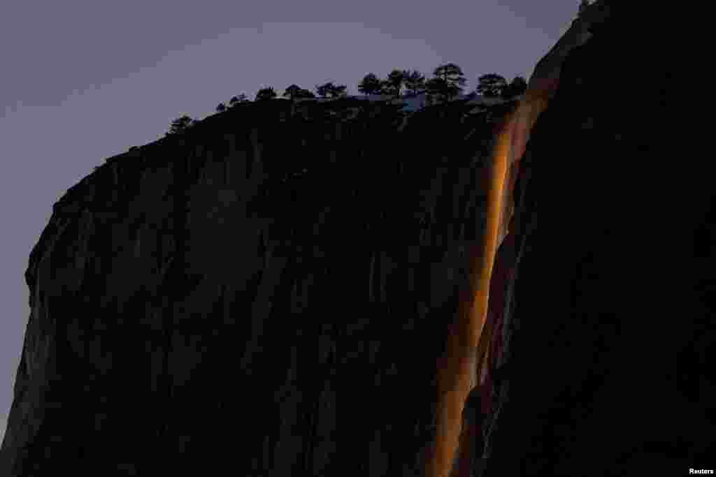 Horsetail Fall at El Capitan is seen during sunset in Yosemite National Park, California, Feb. 15, 2023. The phenomenon of this vista only occurs for a few days in February each year when several weather and climatic conditions are just right. 