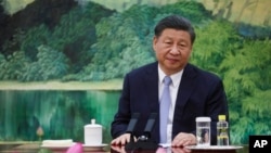 Chinese President Xi Jinping looks on as he meets with US Secretary of State Antony Blinken in the Great Hall of the People in Beijing, June 19, 2023. 