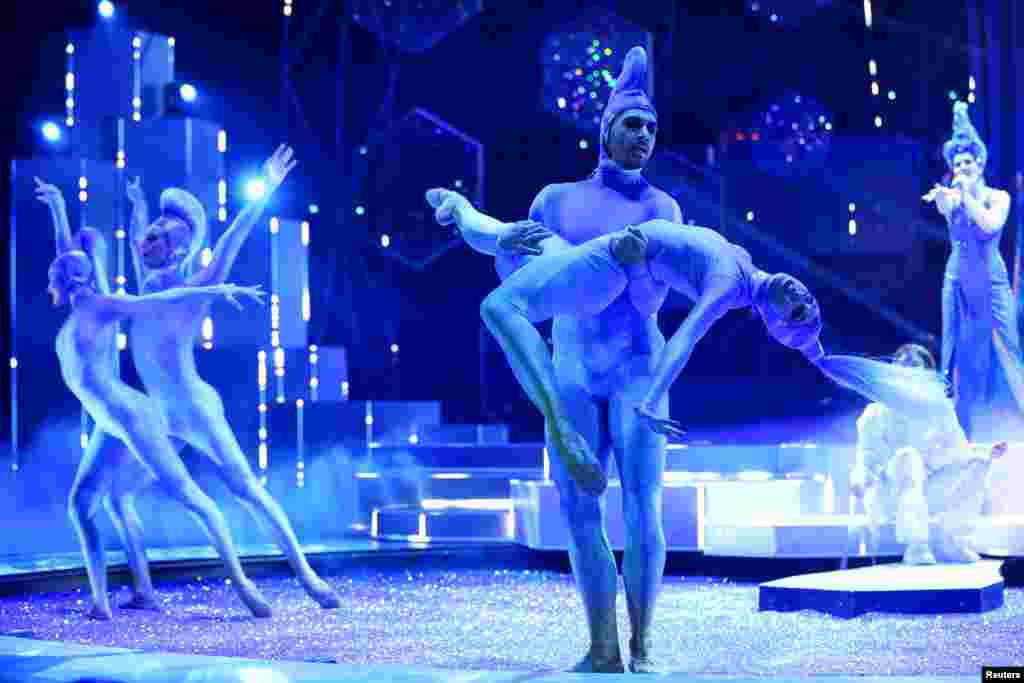 Dancers perform during the dress rehearsal ahead of the world premiere of "Falling in Love" Grand Show at Friedrichstadt-Palast, also known as Palast Berlin, a revue theatre with the largest stage floor in the world, in Berlin, Germany.