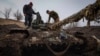 Members of a Ukrainian army tank crew check the equipment for combat deployment, at a military base in Zaporizhzhia region, Ukraine, March 16, 2023. 