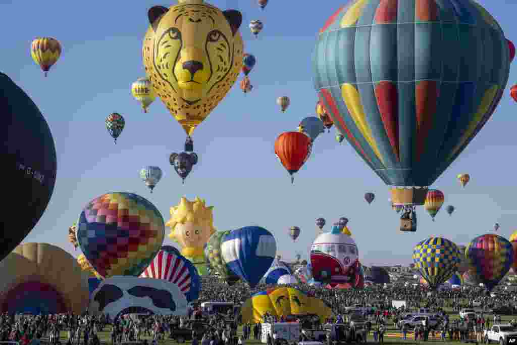 Nearly 500 balloons begin to take off during the Albuquerque International Balloon Fiesta, Oct. 7, 2023, in Albuquerque, New Mexico.