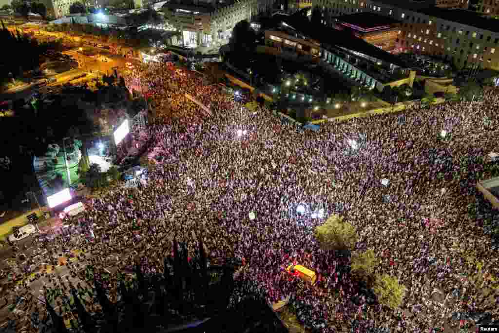 An aerial view shows people taking part in a demonstration against Israeli Prime Minister Benjamin Netanyahu and his nationalist coalition government's judicial overhaul, in Jerusalem.