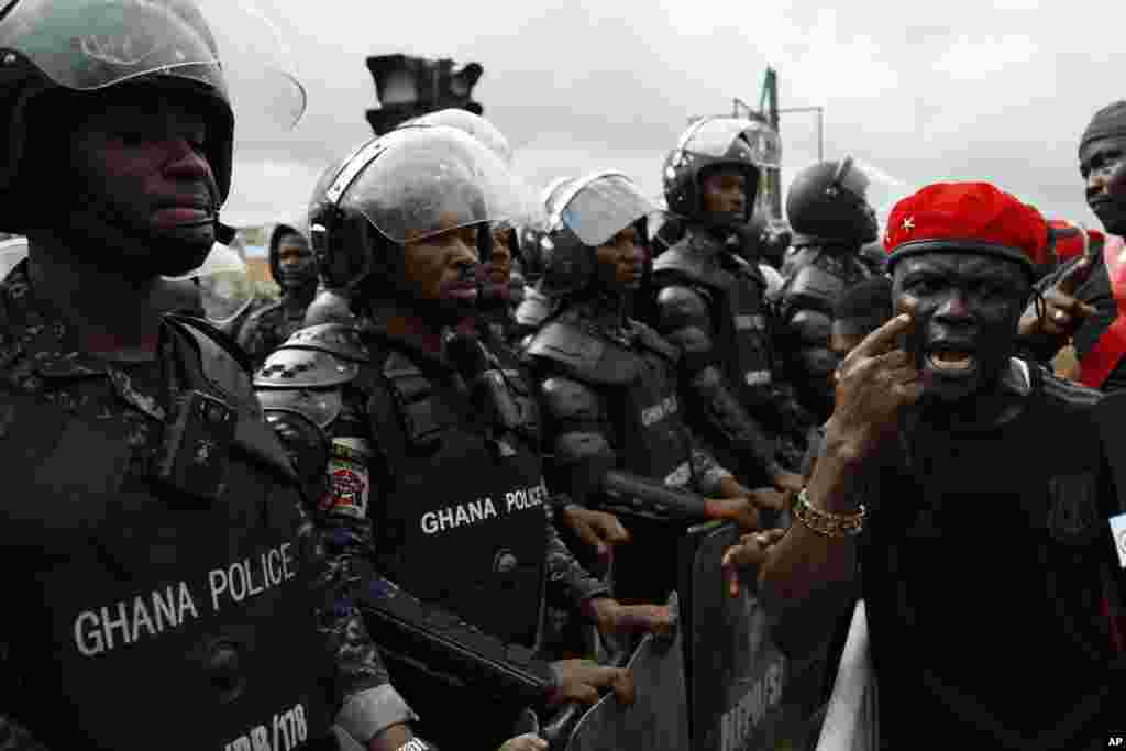 Protesters demonstrate in Accra, Ghana, demanding the resignation of the Bank of Ghana's Governor, Dr Ernest Addison, alongside his two deputies.