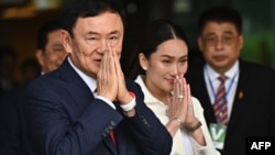 ทักษิณ ชินวัตร อดีตนายกรัฐมนตรีไทย และบุตรสาว แพทองธาร ชินวัตร 