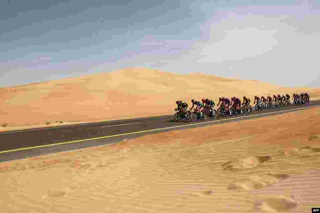 The peloton rides during the first stage of the UAE cycling tour from al-Dhafra Castle to Qassar al-Mighayra St in al-Mirfa in the emirate of Abu Dhabi.