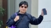 李解新被指街頭演奏《願榮光歸香港》，被法庭裁定7項無牌演奏等傳票控罪成立，判監30日，獲準保釋等候上訴。(美國之音/湯惠芸)