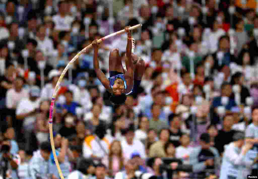 India's Pavithra Vengatesh competes in the women's pole vault final during the 19th Asian Games in Hangzhou, China.