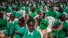 FILE - Kenyan students attending celebrations of Kenya's 60th Independence Day, also known as Jamhuri Day, at the Uhuru Gardens in Nairobi on Dec. 12, 2023. 