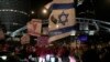 Manifestantes israelíes demandan el regreso de los rehenes retenidos por Hamás en una protesta en Tel Aviv, Israel, el 13 de enero de 2024.