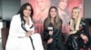 La cantante colombiana Fanny (a la derecha de la imagen), junto a la artista Arelys Henao (izquierda), en la presentación de su nueva canción “Pacto de olvido”. [Foto: Federico Buelvas, VOA].