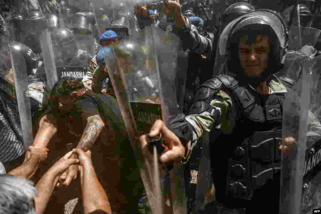 Turkish soldiers of the Gendarmerie General Command use pepper spray against demonstrators during clashes in Ikizkoy, in the Milas district of the Province of Mugla. Local residents and environmental activists engaged in their fifth day of demonstrating against the deforestation project of the century-old pine forest, intended to expand a lignite field in the forests of Akbelen in Ikizkoy.