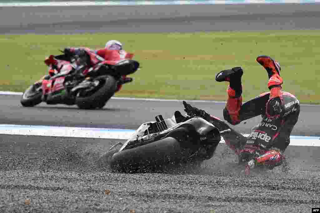 Aprilia Racing rider Maverick Vinales of Spain slips out the track right after the start of the MotoGP Japanese Grand Prix at the Mobility Resort Motegi in Motegi, Tochigi prefecture.