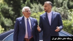 جوزپ بورل و حسین امیرعبداللهیان (آرشیو)