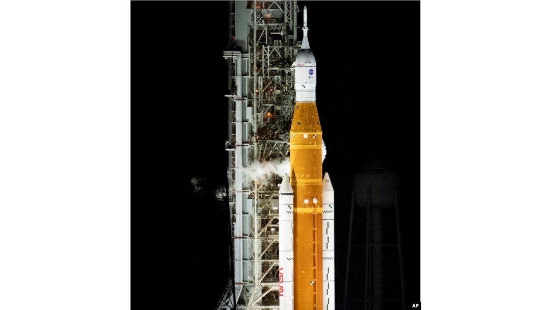 NASA's Space Launch System (SLS) rocket with the Orion spacecraft aboard is seen atop the mobile launcher at Launch Pad 39B, Monday, Aug. 29, 2022. (Joel Kowsky/NASA via AP)
