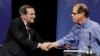 Democratic Sen. Joe Donnelly, left, shakes hands with Republican former state Rep. Mike Braun following a U.S. Senate debate in Indianapolis, Oct. 30, 2018.