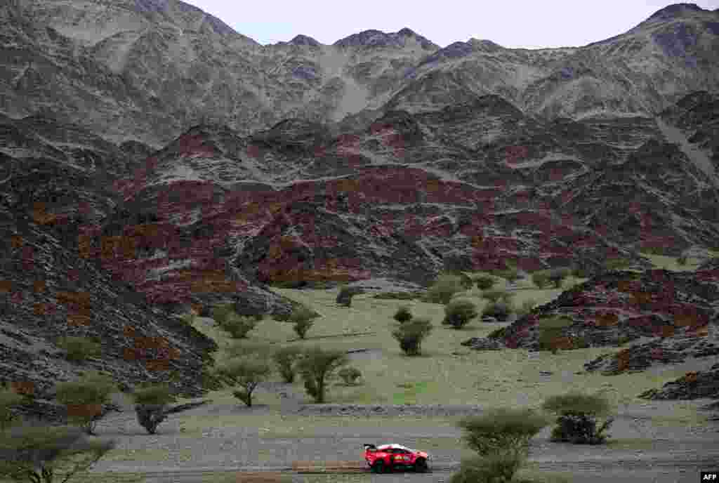 Brx' Argentinian driver Orlando Terranova and Spanish co-driver Alex Bravo compete during the second stage of the Dakar 2023 rally between Sea Camp and al-Ula in Saudi Arabia.