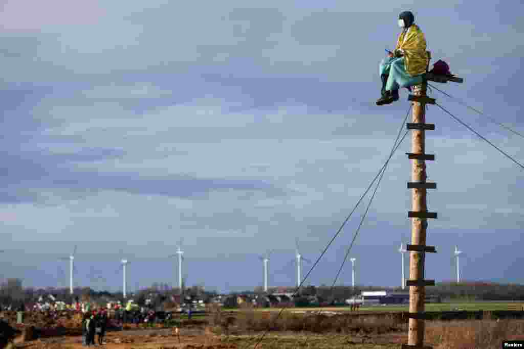 An activist protest against demolition of Luetzerath for the expansion of the Garzweiler open-cast lignite mine of Germany's utility RWE, Jan. 8, 2023.
