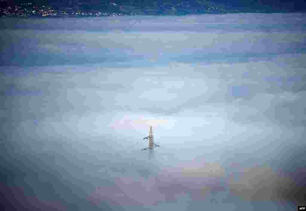Skopje's valley is seen surrounded by fog in Skopje, North Macedonia.