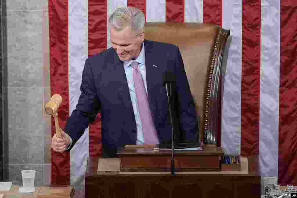 Incoming House Speaker Kevin McCarthy, R-Calif., holds the gavel after accepting it from House Minority Leader Hakeem Jeffries of N.Y., on the House floor at the U.S. Capitol in Washington, Jan. 7, 2023. Republican Kevin McCarthy was elected House speaker on a historic post-midnight 15th ballot, overcoming holdouts from his own ranks.