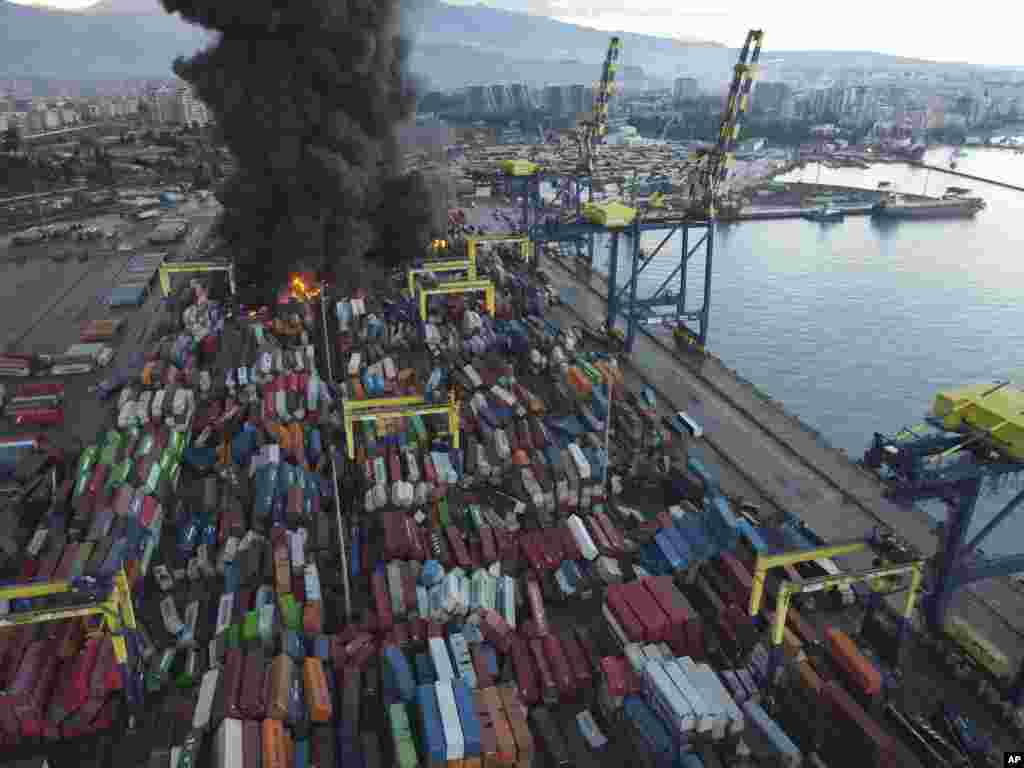 Smoke rises from burning containers at the port in the earthquake-stricken town of Iskenderun, southern Turkey. Reports said the fire was caused by containers that toppled over during the powerful earthquake that struck southeast Turkey.
