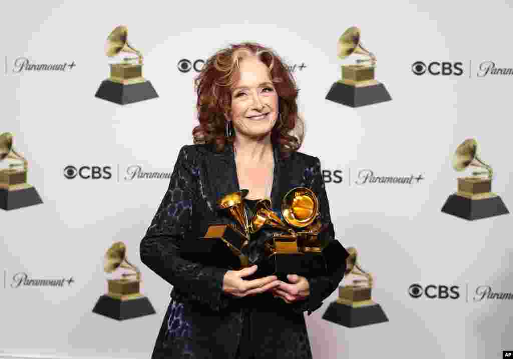 Bonnie Raitt, winner of the awards for Best Song of the Year, Best American Roots Song for "Just Like That" and Best Americana Performance of "Made up My Mind," poses in the press room at the 65th annual Grammy Awards, Feb. 5, 2023, in Los Angeles, California.
