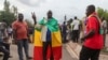 FILE - Thousands march, July 10, 2020, in Bamako, Mali, in anti-government demonstrations urged by an opposition group that rejects the president's promises of reforms.