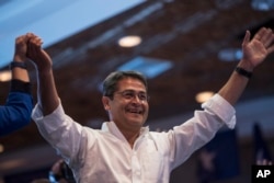 FILE - Honduran President Juan Orlando Hernandez