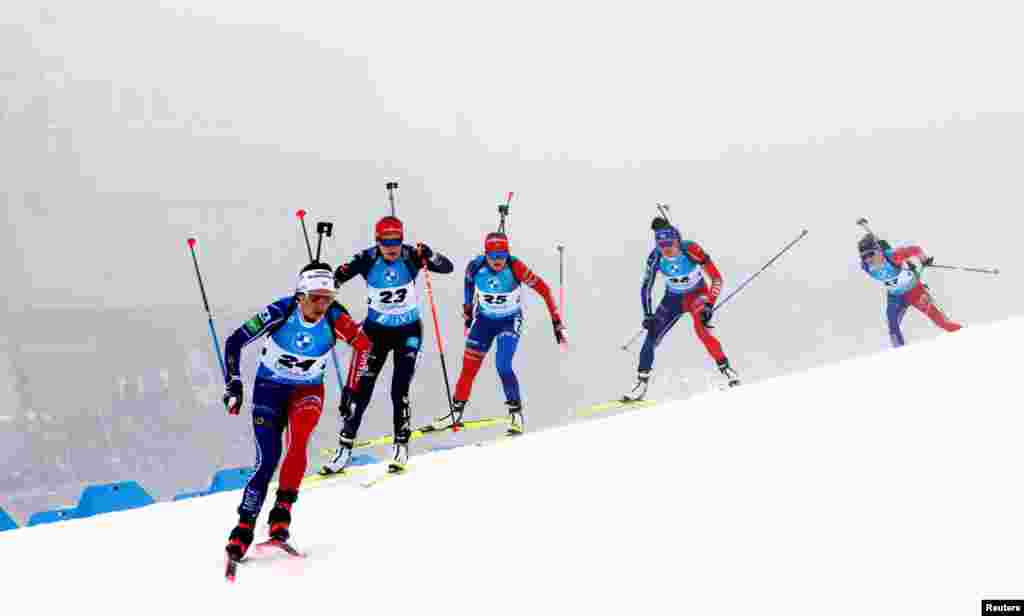 France's Anais Chevalier-Bouchet, Germany's Janina Hettich-Walz, Slovakia's Paulina Batovska Fialkova, France's Lou Jeanmonnot and France's Sophie Chauveau in action during the women's 10km pursuit competition event at the Biathlon World Championships in Oberhof, Germany.
