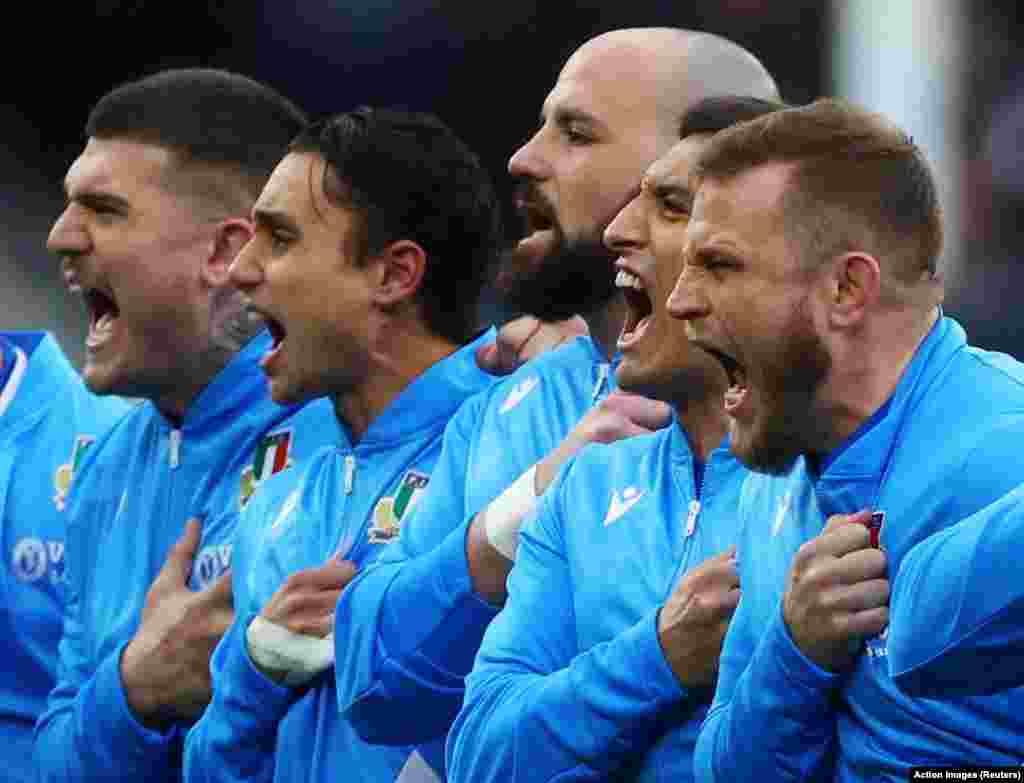 Italy players sing national anthem before the 2023 Six Nations Championship rugby union match between England and Italy at the Twickenham Stadium in London.