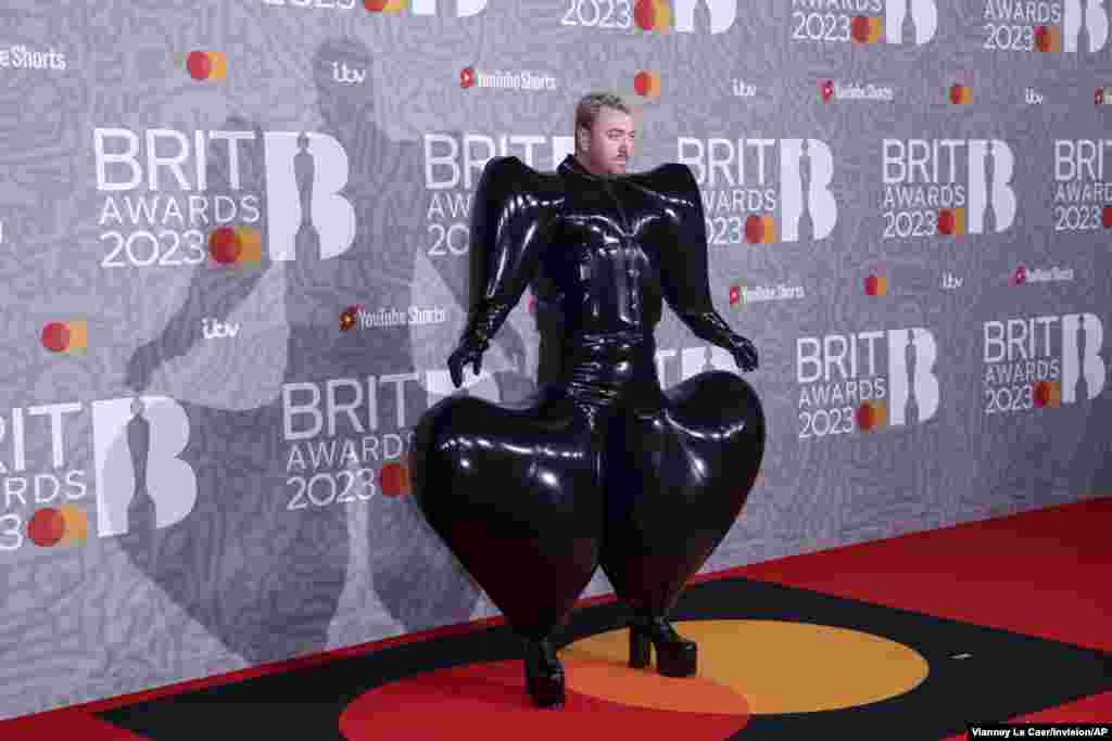 Sam Smith poses for photographers upon arrival at the Brit Awards 2023 in London, Feb. 11, 2023.