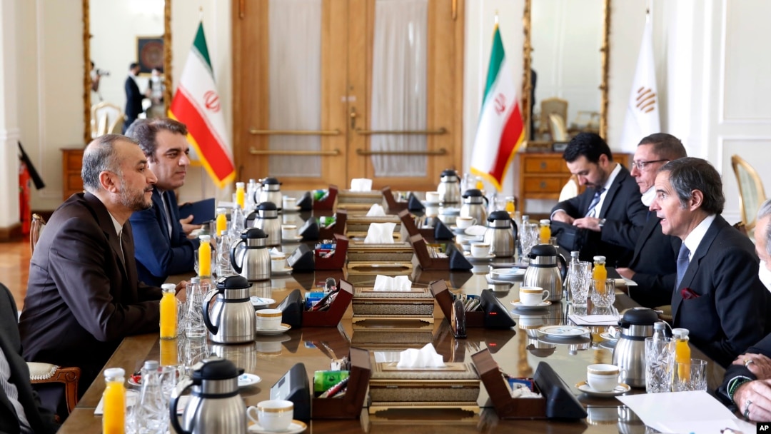 International Atomic Energy Organization, Director General Rafael Mariano Grossi, right, speaks with with Iran's Foreign Minister Hossein Amirabdollahian, left, in Tehran, March 5, 2022. 