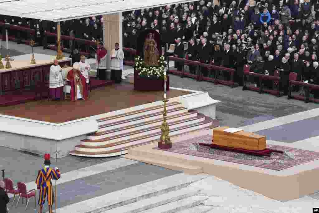 Pope Francis leads a funeral mass of late Pope Emeritus Benedict XVI in St. Peter's Square at the Vatican.
