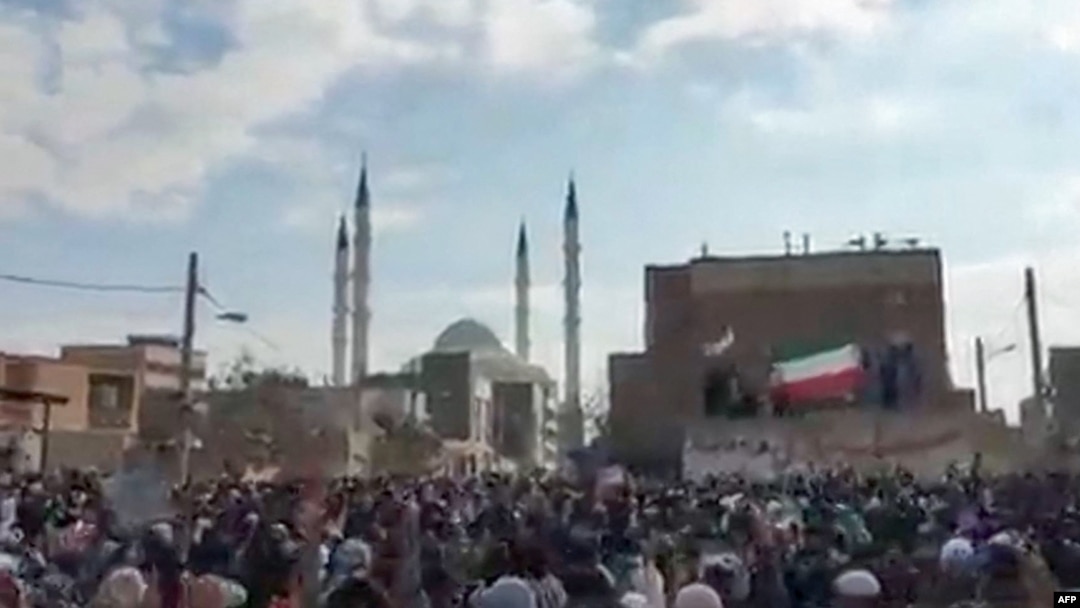 FILE - This image grab from a UGC video made available Dec. 9, 2022, reportedly shows protesters marching after Friday prayers, in Zahedan, Iran.