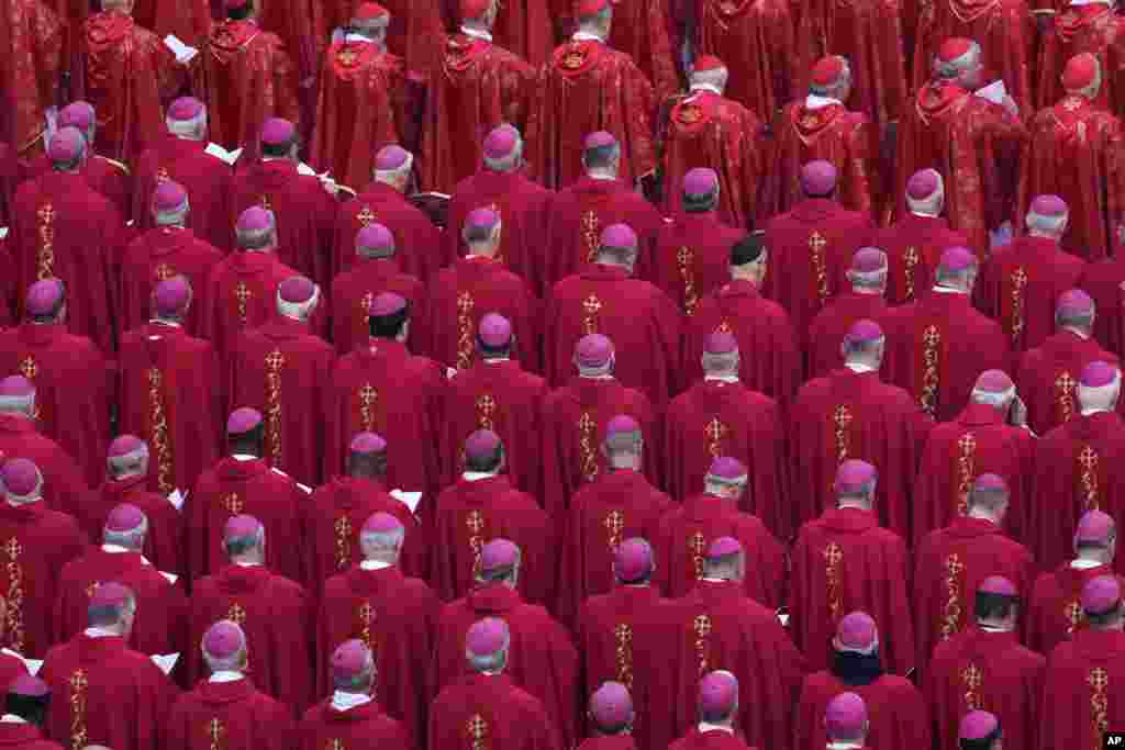Members of the church attend the funeral mass for late Pope Emeritus Benedict XVI in St. Peter's Square at the Vatican. Benedict died at 95 on Dec. 31 in the monastery on the Vatican grounds where he had spent nearly all of his decade in retirement. 